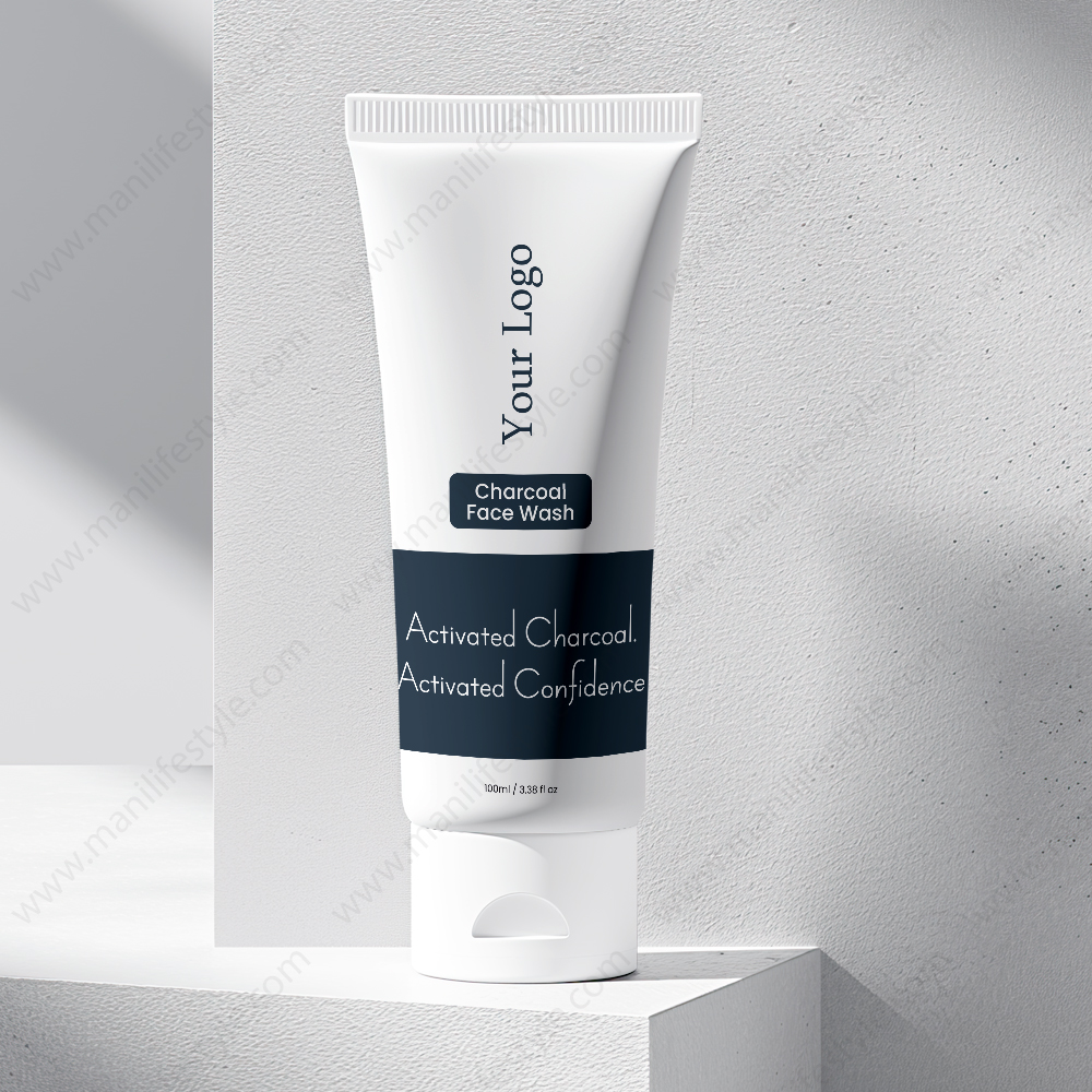 Activated charcoal face wash product tube with charcoal pieces